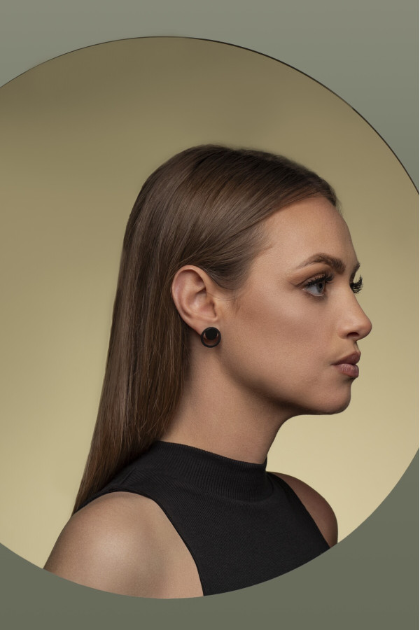 2-in-1 matte black stainless steel earrings featuring open and closed circle design. 2