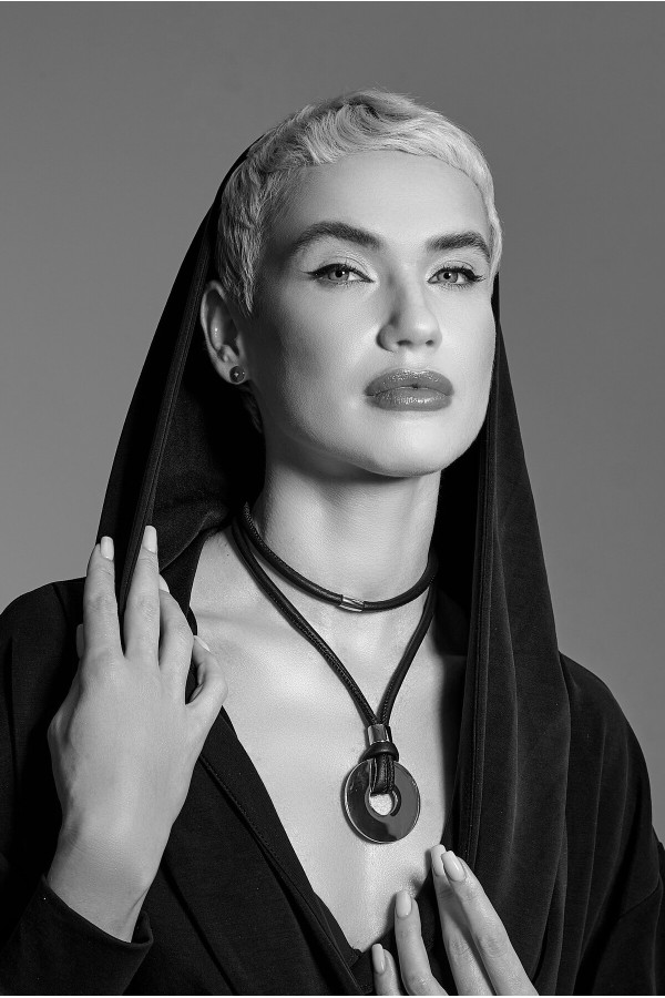 Silver stainless steel hoop earrings with stud closure. 2