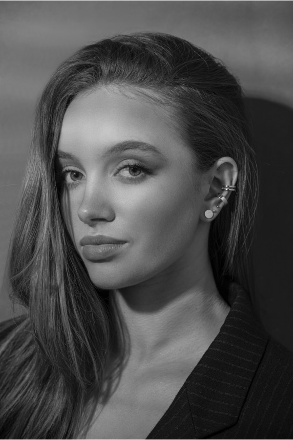 Silver stainless steel disc earrings with a minimalist round shape. 2