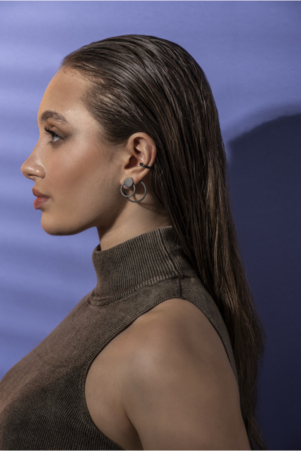 3-in-1 matte black stainless steel earring set with open and closed circle design. 2