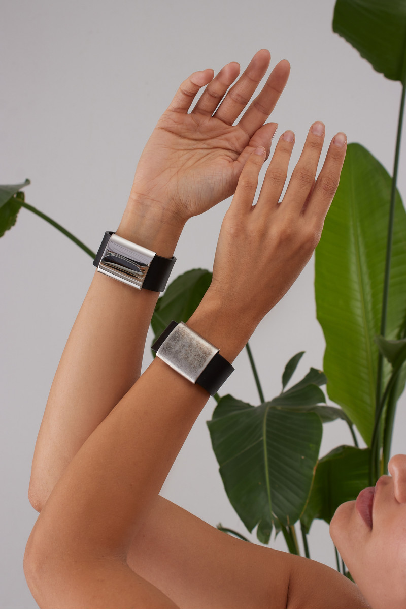 Black leather bracelet with polished steel element