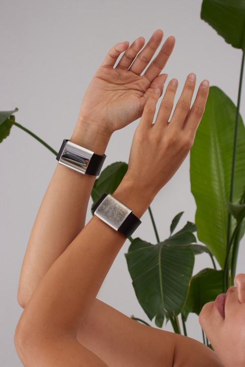 Black leather bracelet with polished steel element