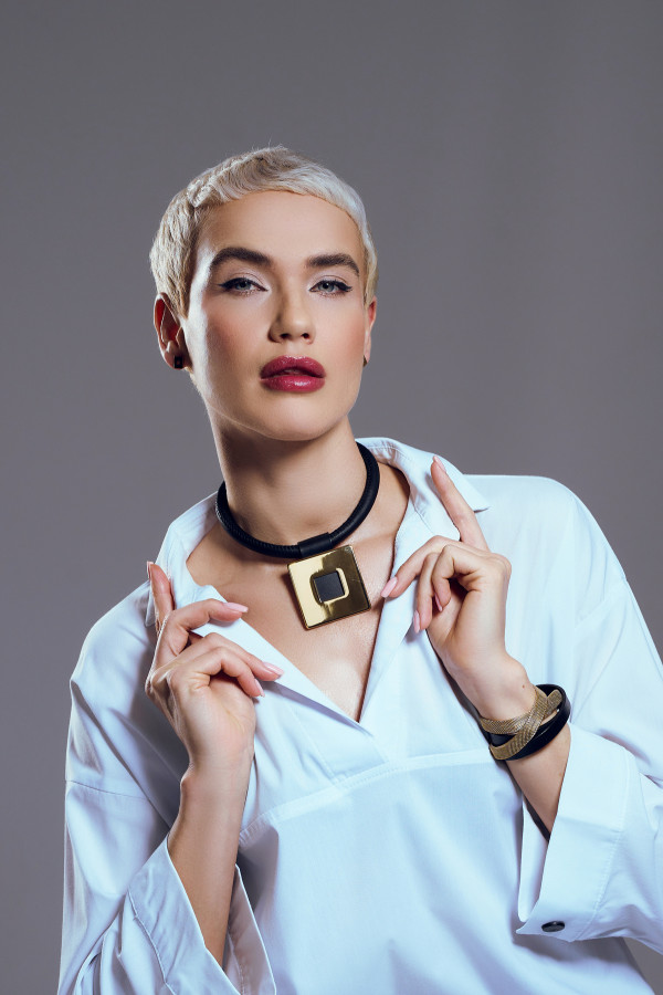 Leather choker necklace with gold square pendant by Moora. 2