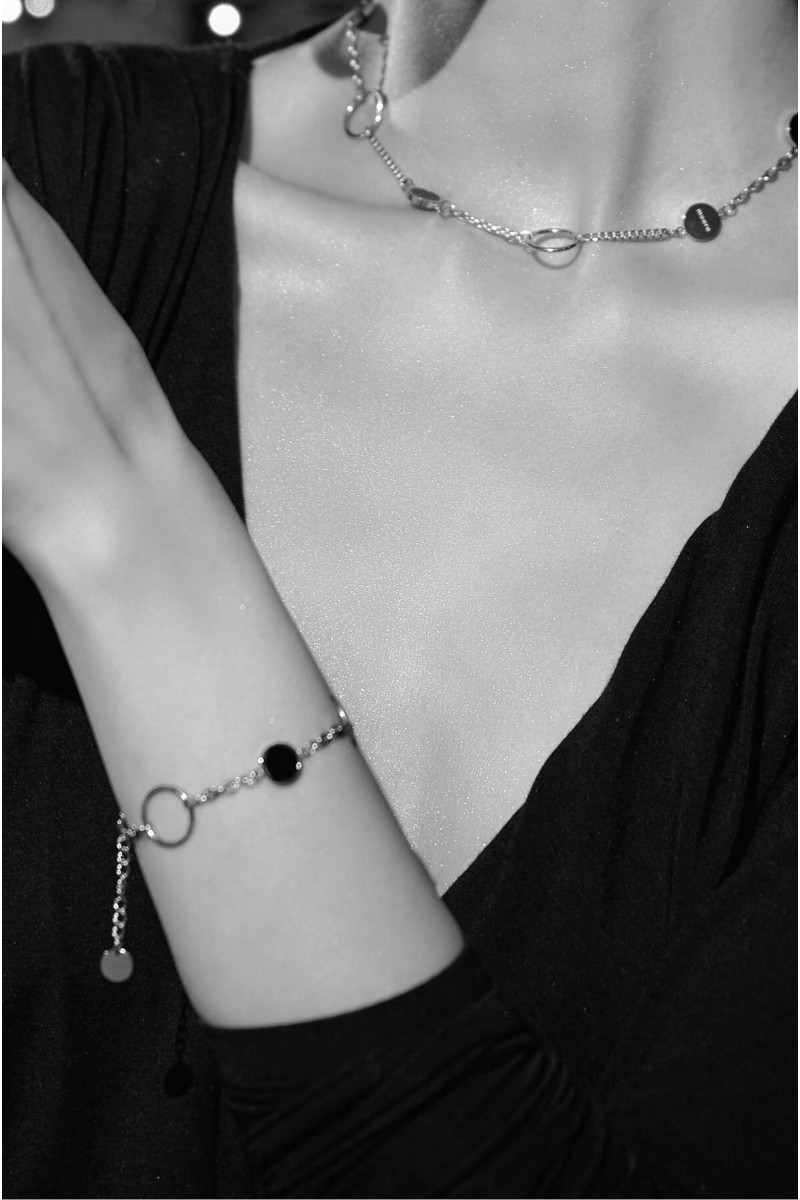 Set of two silver-tone stainless steel bracelets with lobster clasps