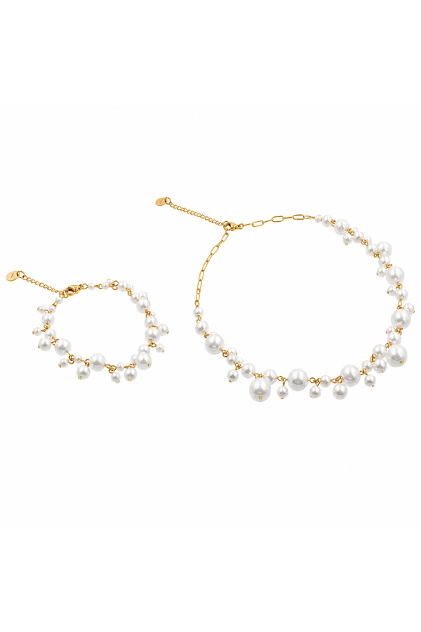 Gold-tone stainless steel pearl jewellery set with a delicate necklace and matching bracelet.