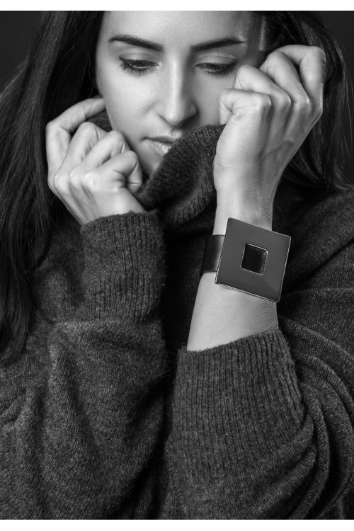 Brown women’s leather bracelet with a gold-plated square
