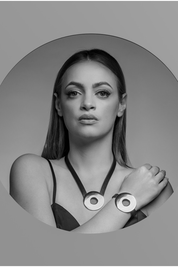 Brown leather necklace with a large polished stainless steel circle 2