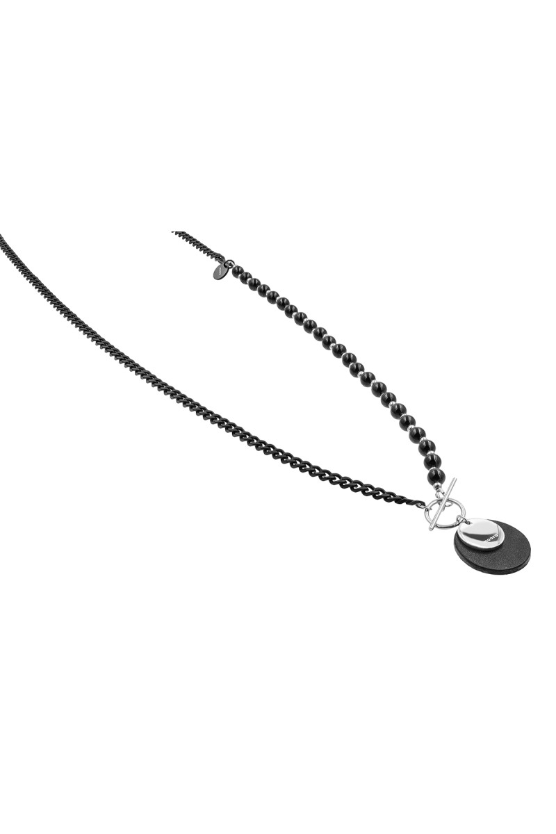 Asymmetric necklace with black onyx, a stainless steel chain, a round leather pendant and a toggle clasp